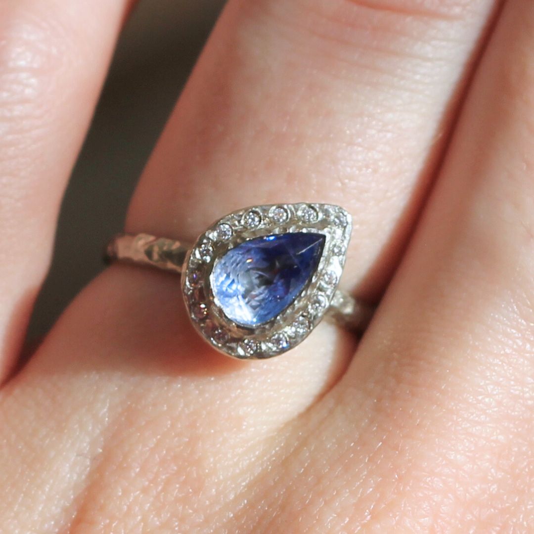 Round Brilliant Blue Sapphire Halo Solitaire Engagement Ring