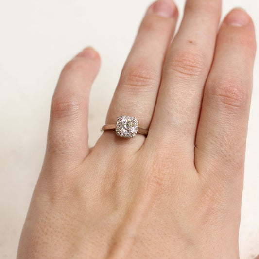 Moissanite and Diamond Halo Engagement Ring