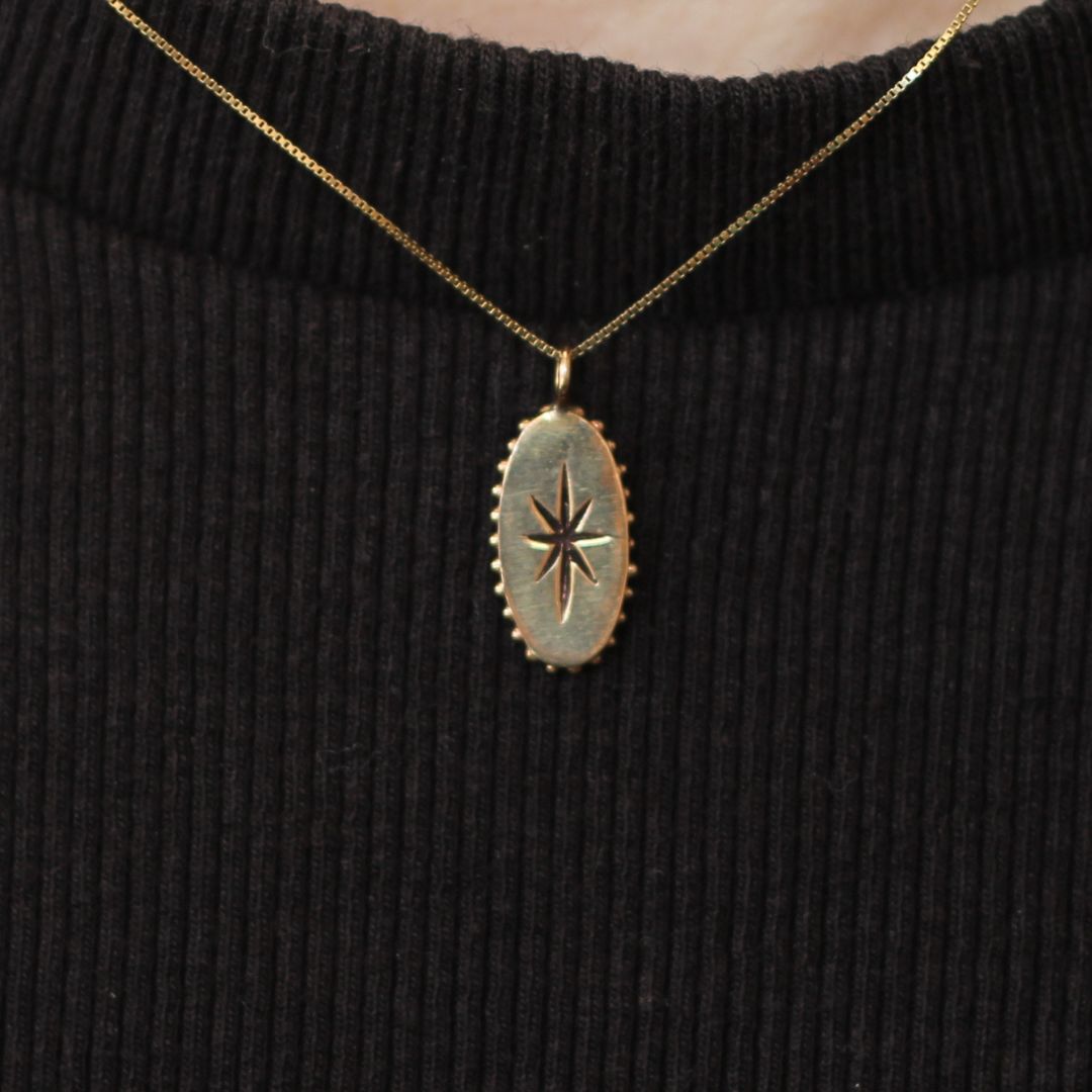 Gold Star Oval Pendant Necklace